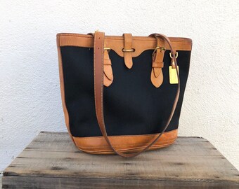 Dooney and Bourke Black Canvas and Tan Leather Bucket Bag Shoulder Tote Bag Shopper Hipster Boho