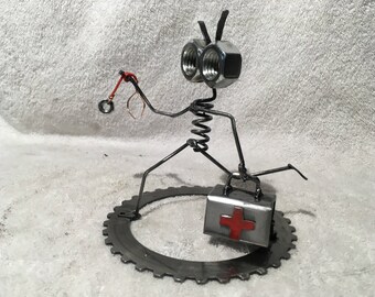 Metal Doctor sculpture.