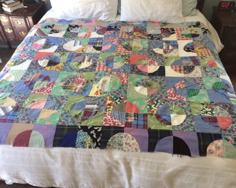 Vintage fun quilt top. Estimated made in 1940's-1950's. Fun colors, beautifully sewn. A lot of blue and green. 65-1/2" x 83".