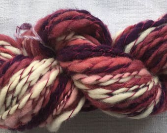 Hand spun island wool in pink-purple shades