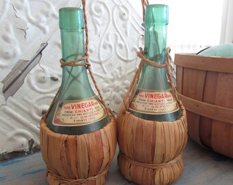 pair of vintage vinegar bottles