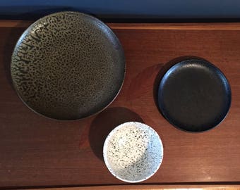 Set of Three Speckled Pottery Plates and a Bowl Italian