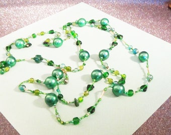 Super long...very green...versatile beaded necklace.