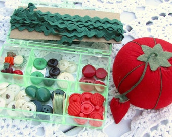 Vintage sewing inspiration box - filled with vintage buttons and sewing supplies shown - vegetable theme - in the shades of red and green
