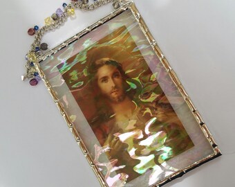 Sacred Heart of Jesus plaque with a Swarovski crystal and freshwater pearl hanger under iridescent water glass
