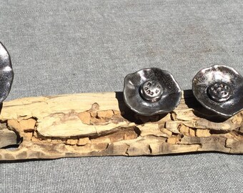 Ceramic flowers on Driftwood