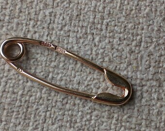 vintage gold 375 * pin weight 0.49 grams