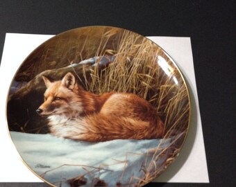 Wild Wings collector plate, "Winter Repose--Red Fox" from Rosemary Millette painting.