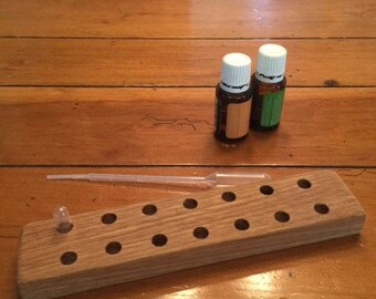 Wooden tray for making essential oil capsules. Size 00 capsules.