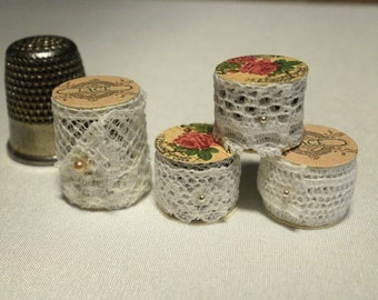 Four Miniature Spools Of Cotton Lace
