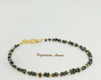 Bracelet made of rough diamonds and gilded elements