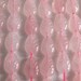 Rose quartz carved leaf beads. 12mm x 8mm. 15" Strand.