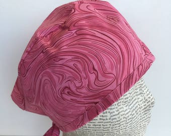 Men's Scrub Cap scrub hat featuring a dark pink swirl material