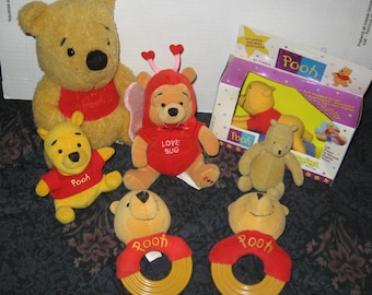 7 Plush Winnie the Pooh Items - Timex - Gund - Disney - Sears - First Years