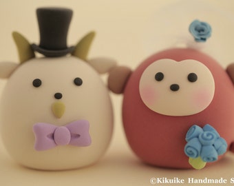 Goat and Monkey wedding cake topper