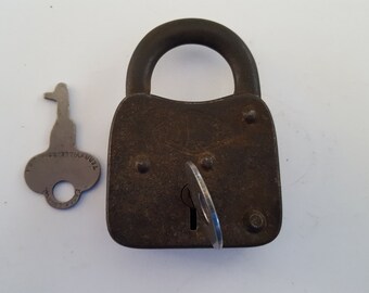 Antique rusty working padlock, lock is made by Reese but both keys are by Eagle Lock Co. and both open the lock