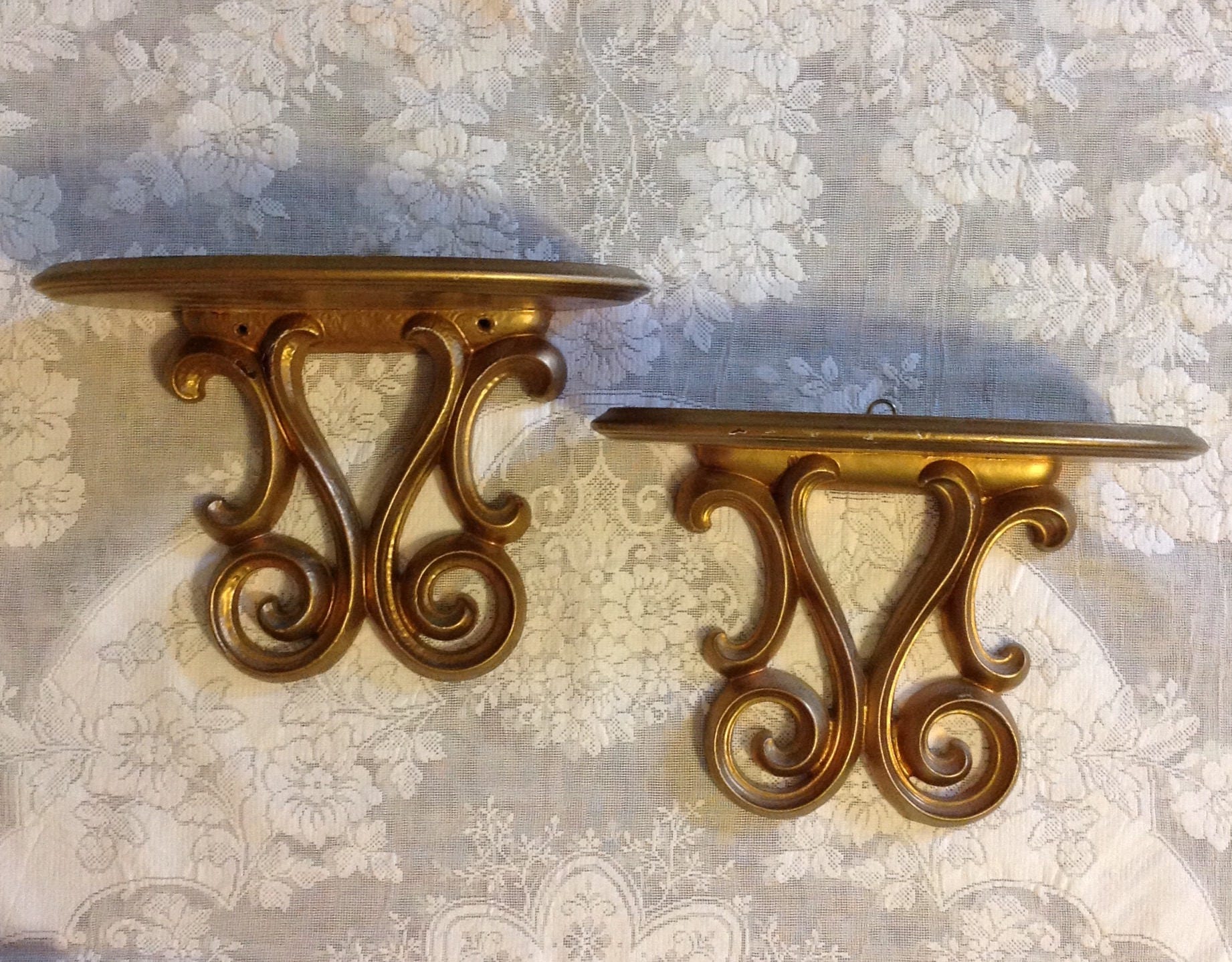 Pair wall sconce shelves ornate gold wood wooden shelf plate
