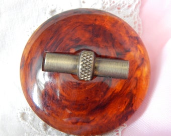 Brass Escutcheon on an Imitation Tortoise Shell Plastic Button