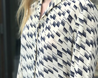 unique collared cream and blue silk blouse