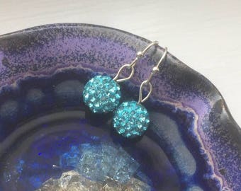 Light blue sparkly ball earrings