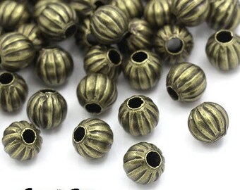 30 6 mm bronze pumpkin beads