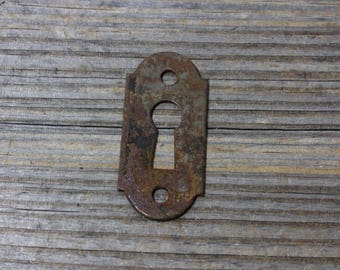 Vintage steel escutcheons or key holes, rusty metal key holes, priced individually. Vintage hardware, hardware, escutcheon, key hole