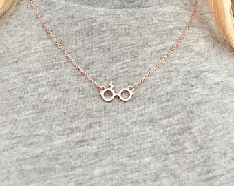 Glasses and Scar Necklace