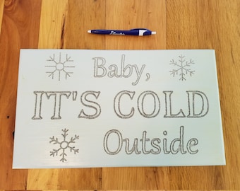 Christmas sign Baby its cold outside