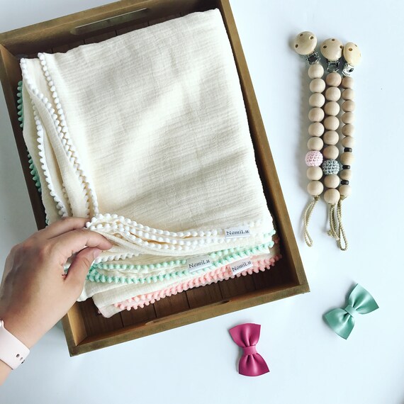 NomiLu Confetti Swaddles - Ivory Mulsin Pom Swaddles - Cotton Muslin Gauze Swaddle Blanket