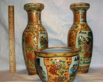 Listing 131 is the Handpainted 3pc set of asian moriage style vases