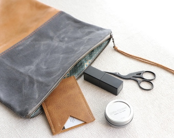 waxed canvas and leather clutch