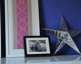 Framed vintage textile from Thailand in pea green and hot pink geometric woven pattern