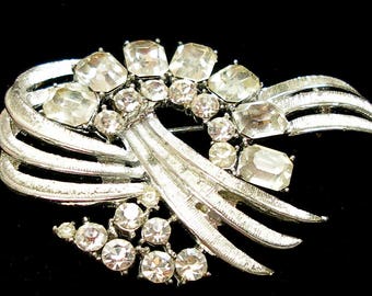 CORO signed Rhinestone brooch, Ribbon swirl design. 2.5"