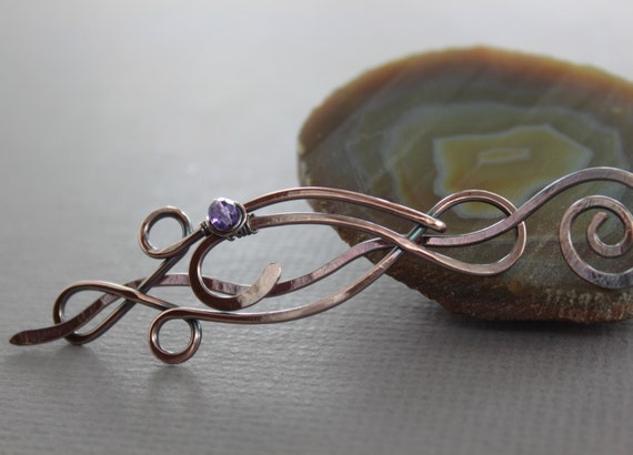 Swirly lotus hair barrette in copper with wrapped amethyst