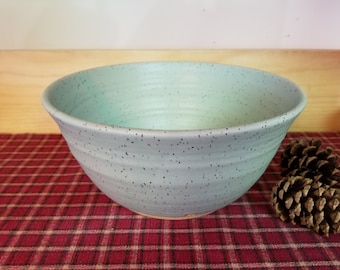 Icy turquoise pottery bowl