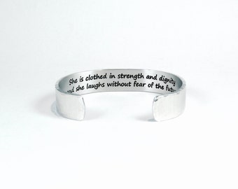 Encouragement gift "She is clothed in strength and dignity and she laughs without fear of the future" 1/2" hidden message cuff bracelet