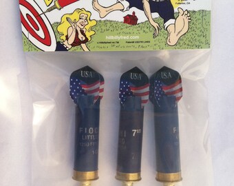 darts hillbilly shot shell darts. Set of 3. great fun! Use to pick numbers at your superbowl balloon board! See who can hit the bullseye!