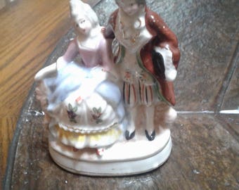 Vintage Colonial figurine made in occupied japan.