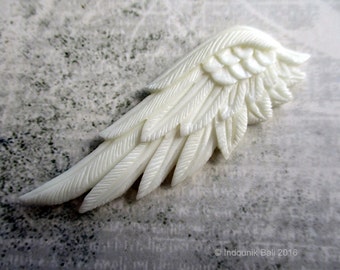 Lifted Carved Bone Wing 60mm Double Sided Undrilled