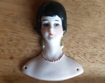 China Deco Pincushion doll bas relief head.