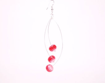 Interchangeable kinetic Earrings