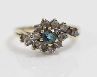 9ct Gold CZ Clear Cut Cluster Ladies Ring Raised Twisted Top with Light Blue Sapphire UK N 1/2 US 7