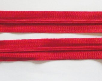 Zipper zips Red