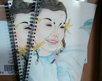 Blank notebook with Björk watercolor cover art