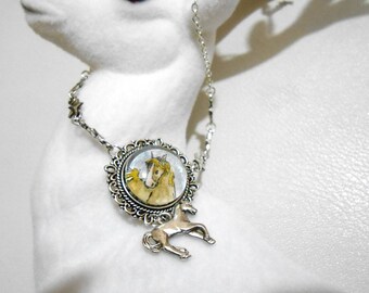 Palomino horse with watercolors in a cabochon necklace