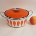 Cathrineholm orange Lotus Enamel pot - Casserole 60s. Gretr Prytz Kittelsen.