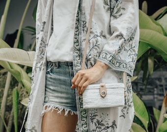 The white natural Ata grass bag , a must have for every boho girl this summer
