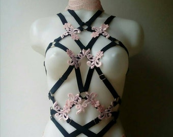 Full body harness embellished with pink lace