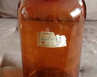 Antique apothecary bottle in amber glass