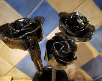 Hand forged roses and vase